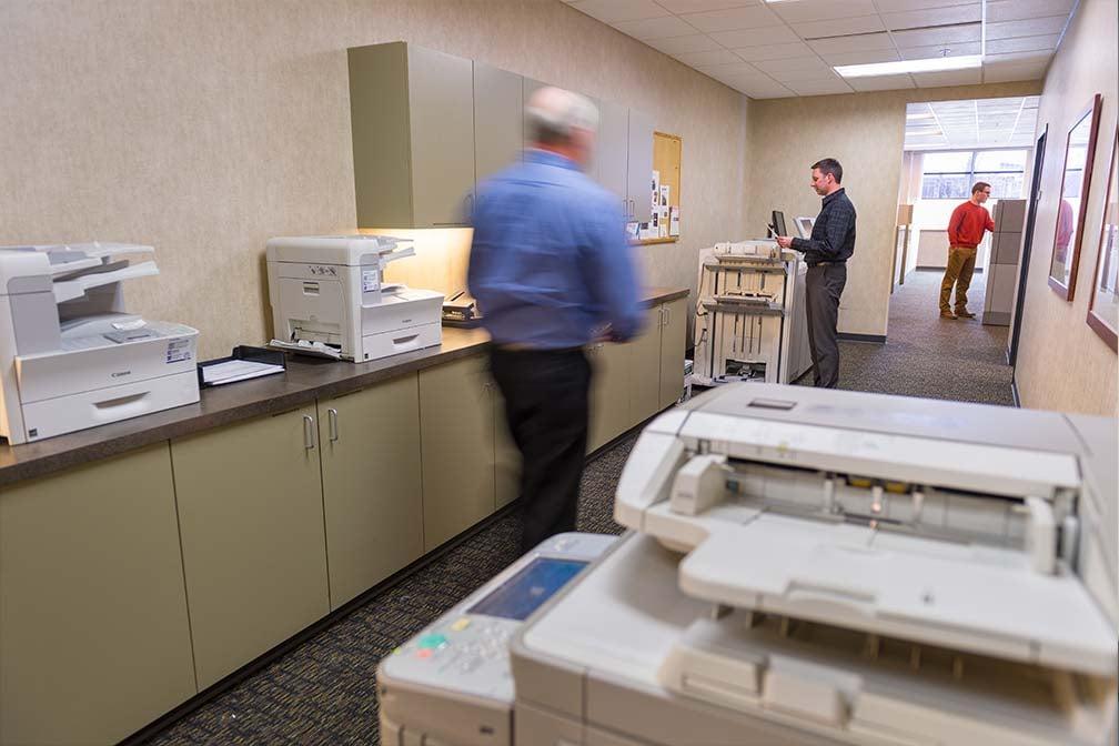 busy_copier_room_in_hallway_area
